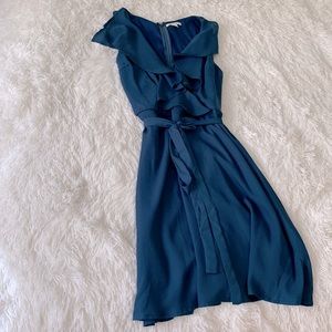 Miami size medium teal dress. Ruffle V-neck. Tie waist.